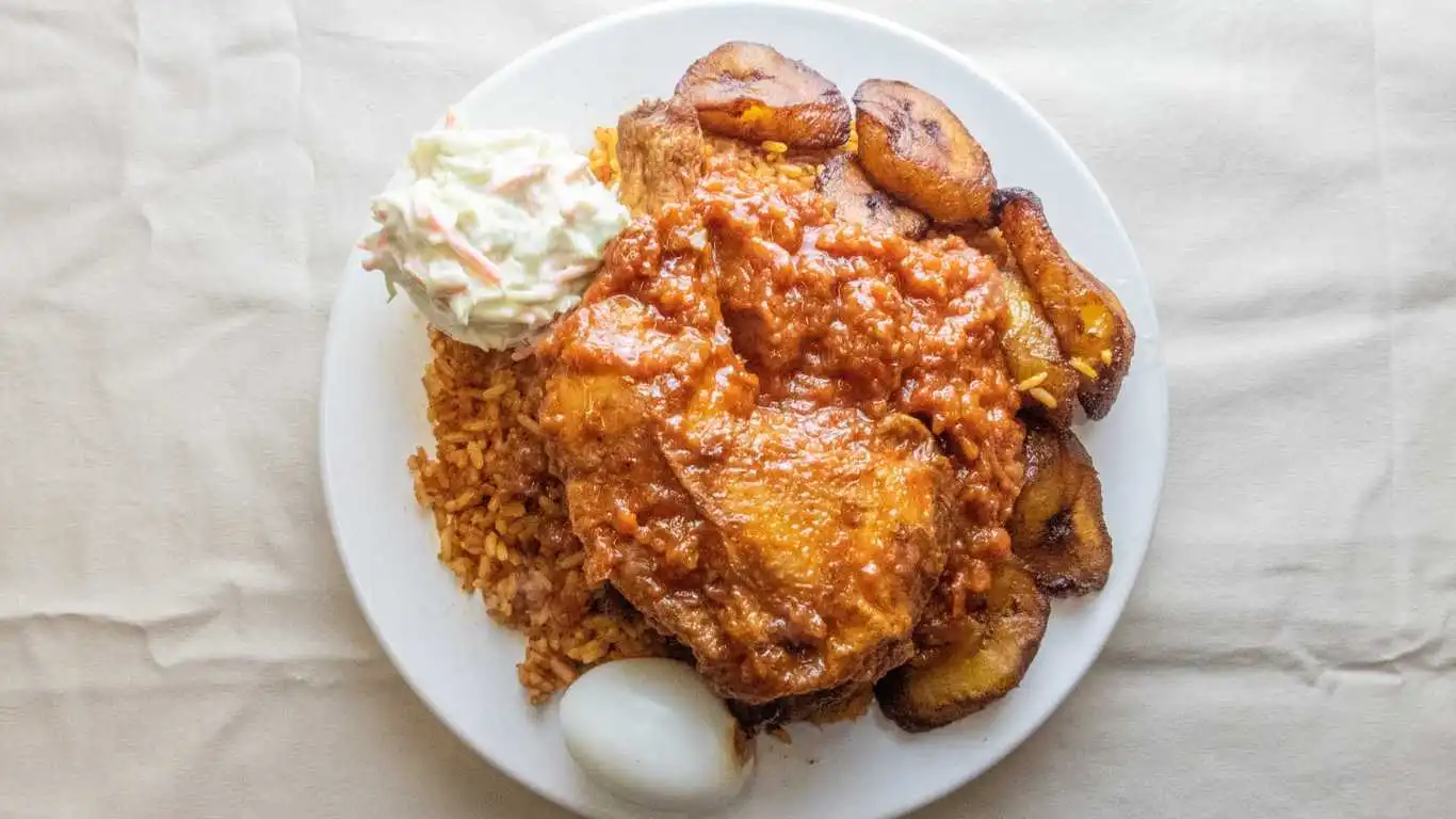 Jollof Rice with Chicken, Egg and Plantain at Atiga Restaurant in Winnipeg, MB